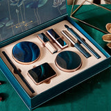 A Box Of Eight-Piece Floral Jade Jade Makeup Set